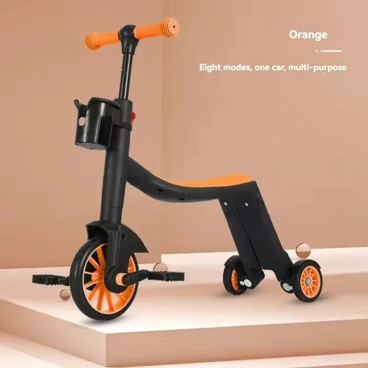 "High-visibility bright orange toddler tricycle with a sturdy 3-wheel design for safe outdoor play."