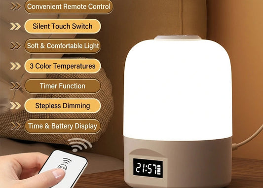 White night light with remote control and time display on a wooden surface.