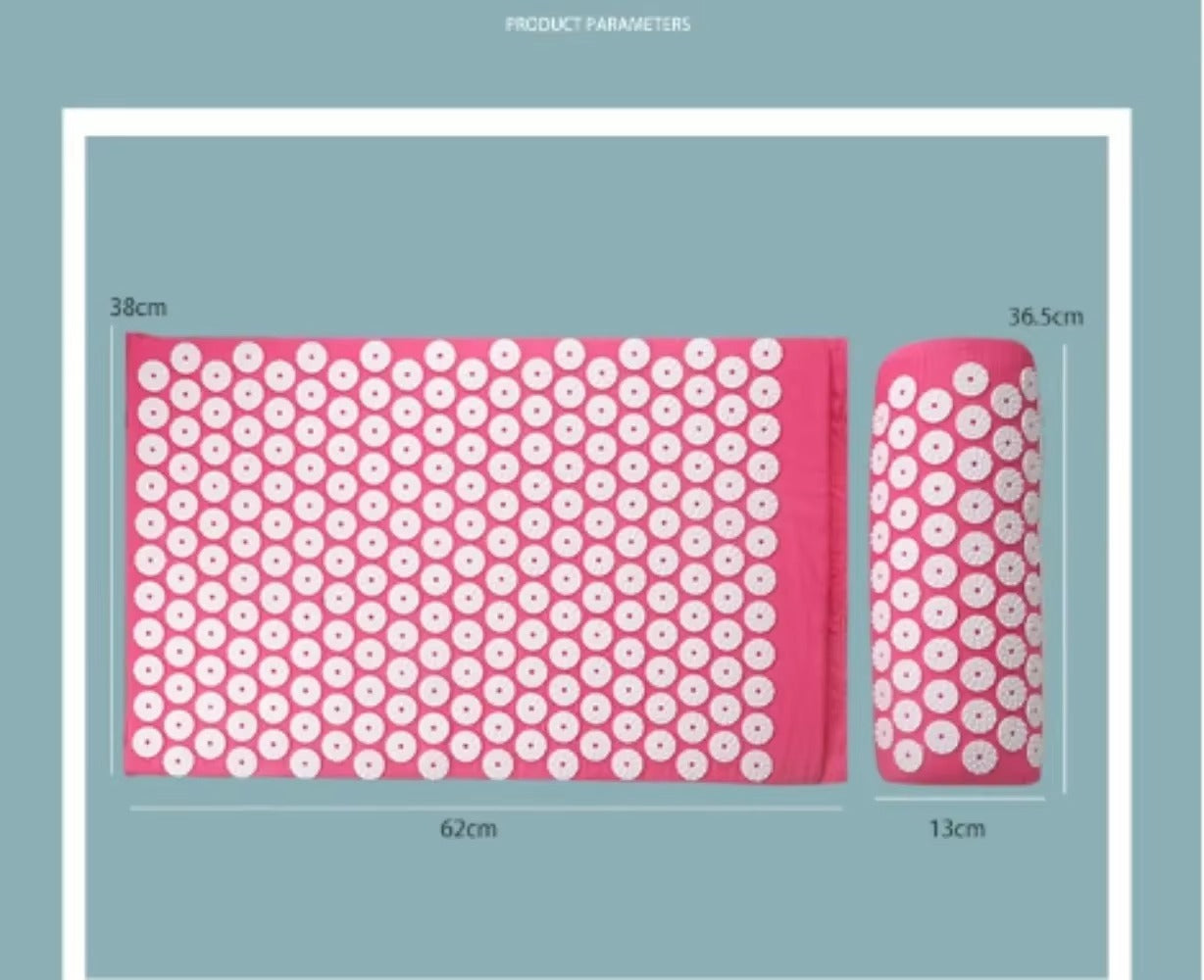The CORECOM® acupressure set rolled up and tucked into its black travel-friendly carry bag.